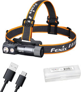 Fenix headlamp with USB cable and battery pack on a white background